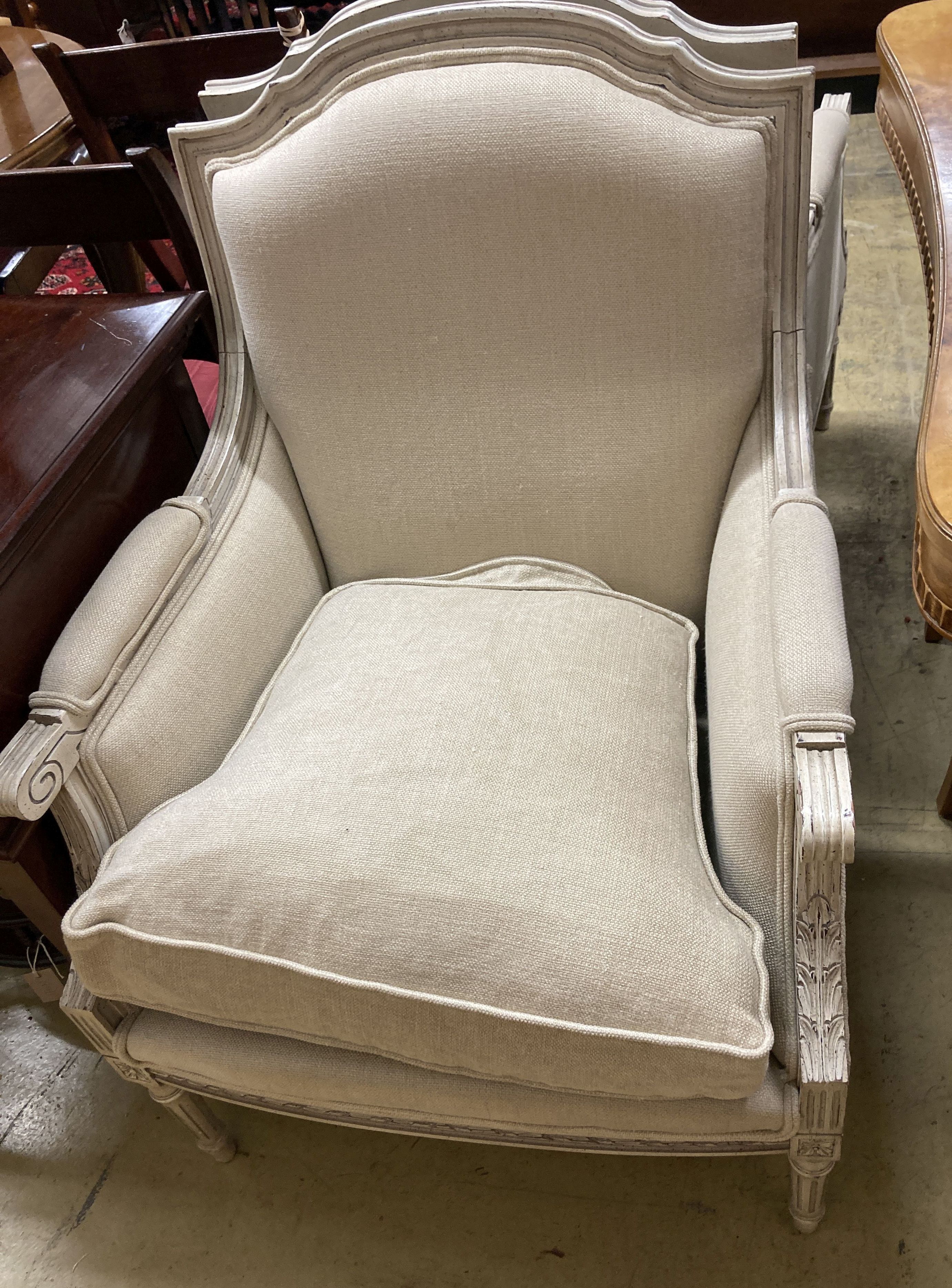 A pair of painted French style upholstered armchairs, width 70cm, depth 70cm, height 96cm